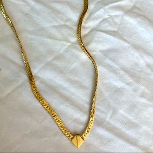 1/2off4• Gold toned v shaped necklace.